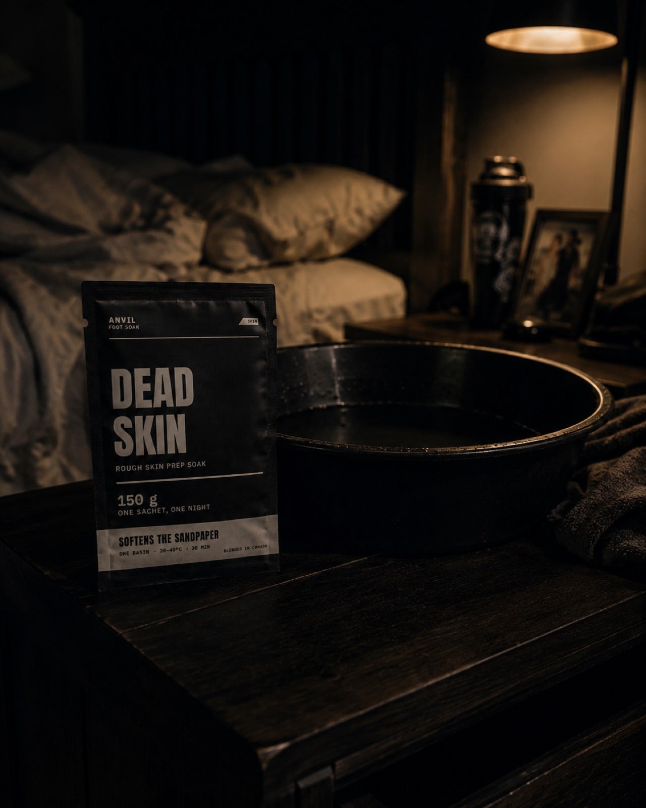 ANVIL Dead Skin sachet and a dark basin on a bedroom nightstand