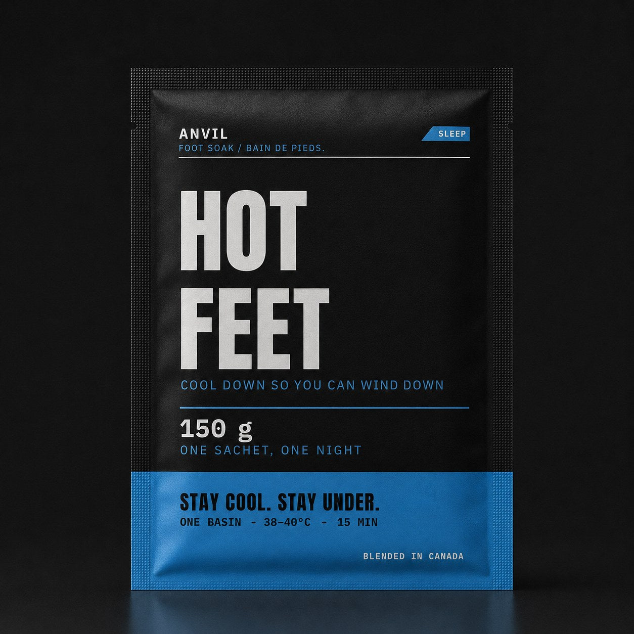 Matte black HOT FEET sachet with steel-blue sleep band, studio shot